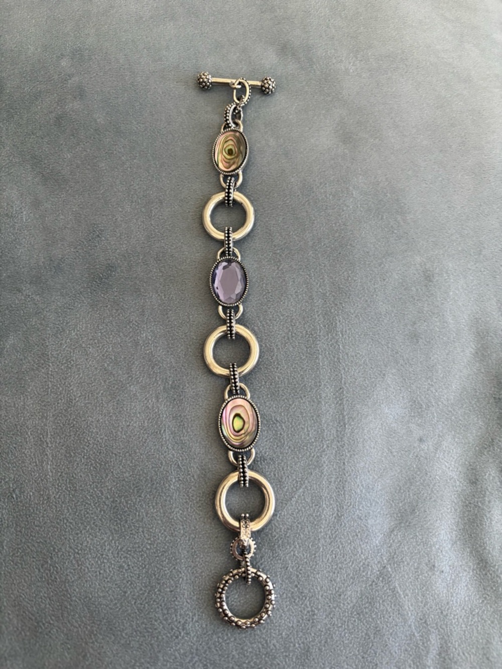 Lia Sophia, silver Link Bracelet with Purple and Iridescent Accents.